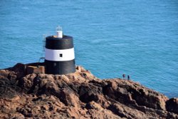 Hikers Visiting the Martello Day Marker at Noirmont Point