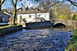 Malham Beck Flowing by the Old Post Office in Malham Village Wallpaper