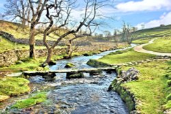 Downstream View of Malham Beck with the Old Clapper Bridge Wallpaper