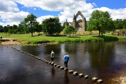 Classic View of Bolton Abbey and the Stepping Stones Wallpaper