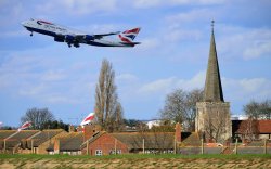 Boeing 747 Jumbo Jet Leaving Heathrow Via St Mary's Church at Stanwell Wallpaper