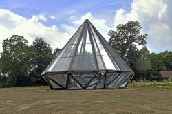 A new  ten-sided ‘kinetic’ glasshouse at Woolbeding Gardens