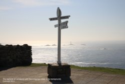 The Signpost at Land's End (with the Longships Islets in the background) Wallpaper