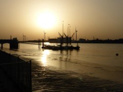 Three Thames Barges Moored at Gravesend at Sunset Wallpaper