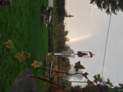 Wonderful rainbow outside pub near Christchurch Wallpaper