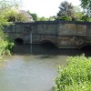 The ancient and picturesque bridge over the river Windrush, in the town of Burford, Oxfordshire
