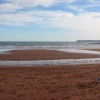 Paignton beach, Devon,  with Berry Head in the background