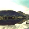 Mirror smooth Lake Ullswater, Cumbria.