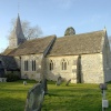 Woodmancote Church with what appears to be a ghost