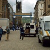 Market traders vehicles outside The Open Market, Huddersfield.