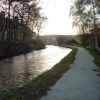 The village of Rodley can be seen in the distance as the Leeds and Liverpool canal approaches