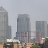 The Tower of Canary Wharf and its Six Grey Dwarfs