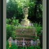 one of the many many angels that grace the landscape in Highgate Cemetery