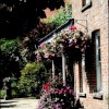 The flowery doorway of the Abbey July 2005