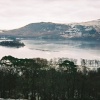 A frozen Derwent Water from the fell side path below Cat Bells Derwent , Cumbria