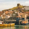 Whitby Life Boat Station overlooked by the parish church of St. Mary. Whitby, North Yorkshire