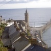 The clock tower and pier at Porthleven in South Cornwall