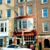 High Street in Portsmouth, Hampshire. Monks Wine Bar