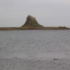 Lindisfarne Castle from the harbour beach.