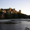 The low autumn sun lights up Durham Castle and Cathedral. Viewed from Framwellgate Waterside.
