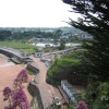 Goodrington North beach and Park, Devon from Roundham Gardens cliff walk.