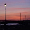 'Sunset' - A view of part of Bournemouth pier at dusk.