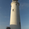 The lighthouse on the spit by Hurst Castle, near Lymington Hampshire, UK.