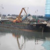 The Union Arrow unloading it's cargo on the river Arun at Littlehampton, West Sussex