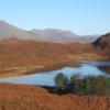 Beacon Tarn set in the Blawith Fells, Cumbria.  Looking towards Coniston-Old-Man.