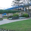 Wall & garden by Swanswell Gate; modern bridge over top; Coventry, West Midlands; Feb 2005