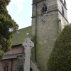 The Parish Church of St Swithun and the War Memorial at Woodborough, Nottinghamshire