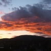 Colourful sunset at Millom, silhouette of Black Combe.