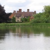 Packwood House, Warwickshire. Looking towards the house from across the pool