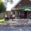 Locals enjoy a coffee at the post office,  New road, Cutnall green