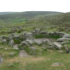 One of the huts at the Bronze-Age village of Grimspound, on Dartmoor