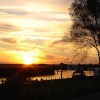 REEDHAM, NORFOLK. SUNSET VIEW IN OCTOBER FROM 'ROSE COTTAGE'