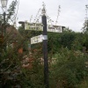 Intriguing little fingerpost outside a farm on a country road near Bromyard, Herefordshire