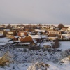 view of Camber, East Sussex from the Sand dunes. Looking over to Romney Marsh