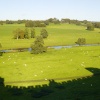 Shadow of Alnwick Castle looking down over the valley. Northumberland