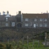 Houses overlooking Craster Harbour and Craster Village Northumberland.