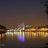 London Putney at night seen from the towpath on the Barnes side of the River Thames.