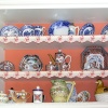A friends display of China dishes and teapots in Dorking, Surrey
