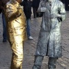 Living Statues passing the time of day at Covent Garden, Greater London.