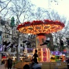 Leicester Square Christmas Fair, London, Greater London, The Chairs (Charlie Chaplin looking on).