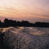 Aegir (tidal bore) at Sunset. Gainsborough, Lincolnshire.