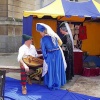A lute player with two ladies at Gloucester Medieval Fayre in June 2006.