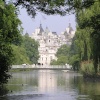A glimpse of Horseguards Parade across the lake in St James Park, central London.