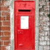 Wall mounted, and much repainted Edward VII Postbox, Upper Row, Dunham-on-Trent, Nottinghamshire