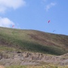 Flyers on a sunny day coming off Mam Tor