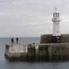 Lighthouse marking the outer edge of Mevagissey harbour, Cornwall